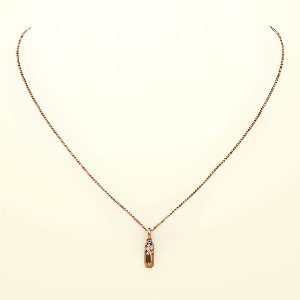 
            
                Laden Sie das Bild in den Galerie-Viewer, Eine Halskette in Form einer Kapsel, aus fairem Roségold mit Regenbogen Saphiren. Von FENA daily Jewellery
            
        